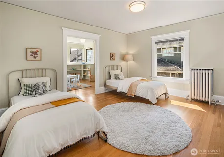 a living room with furniture and a flat screen tv or window