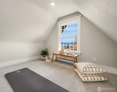 a living room with granite countertop furniture and a large window