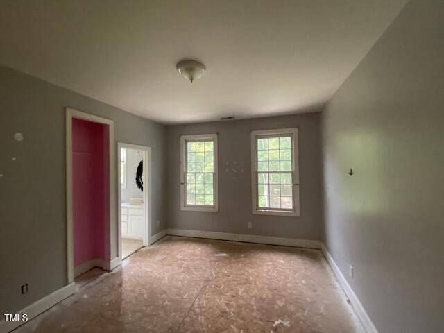 10912 Cahill Road Raleigh, NC 27614 - Photo 44 of 61 an empty room with windows