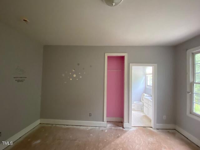 10912 Cahill Road Raleigh, NC 27614 - Photo 45 of 61 an empty room with windows