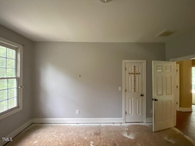 10912 Cahill Road Raleigh, NC 27614 - Photo 50 of 61 an empty room with windows