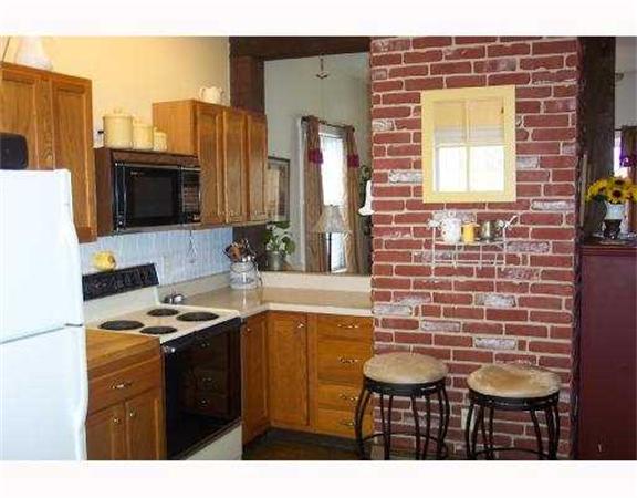 982 Crandall Road Tiverton, RI 02878 - Photo 5 of 10 a kitchen with a sink cabinets and window