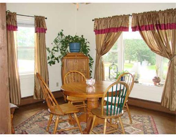 982 Crandall Road Tiverton, RI 02878 - Photo 6 of 10 a dining room with furniture and a window