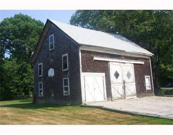 982 Crandall Road Tiverton, RI 02878 - Photo 9 of 10 a view of a house with a yard