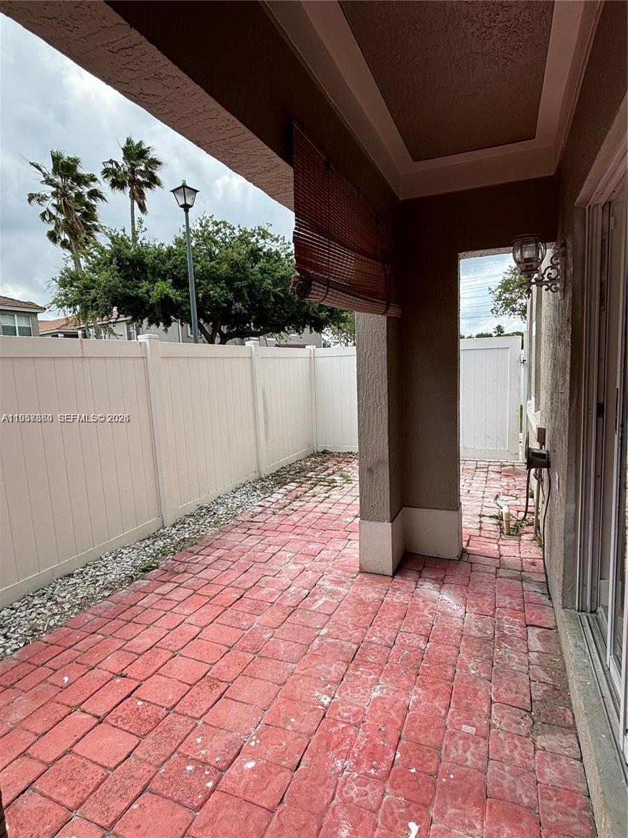 12637 Southwest 54th Street Miramar, FL 33027 - Photo 16 of 16 a view of a backyard of the house