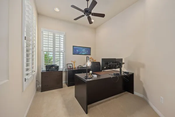 a bedroom with a bed dresser and a window