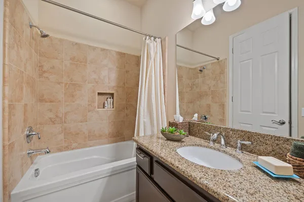 a view of a sink and cabinets