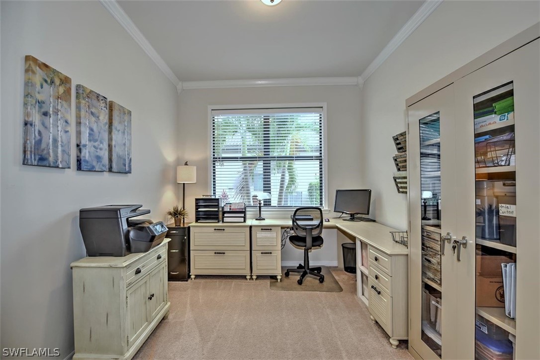 10928 Dennington Road Fort Myers, FL 33913 - Photo 15 of 35 a view of a workspace with furniture and a window