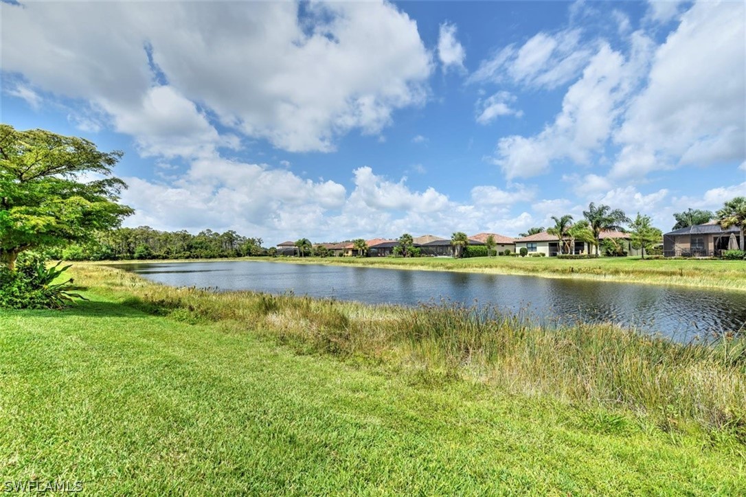 10928 Dennington Road Fort Myers, FL 33913 - Photo 28 of 35 a view of a lake with a big yard