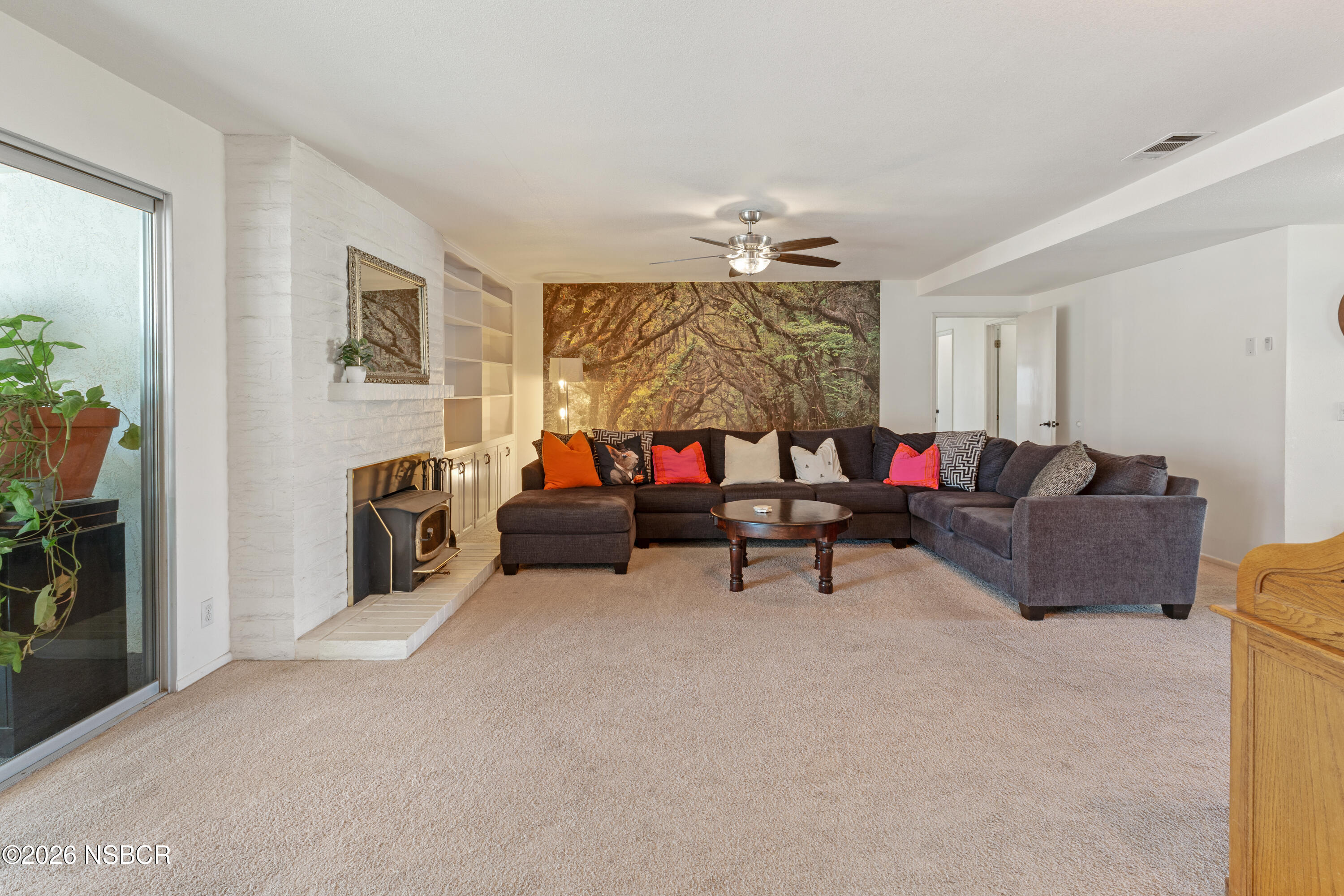 4220 Constellation Road Lompoc, CA 93436 - Photo 5 of 22 a living room with furniture and a chandelier