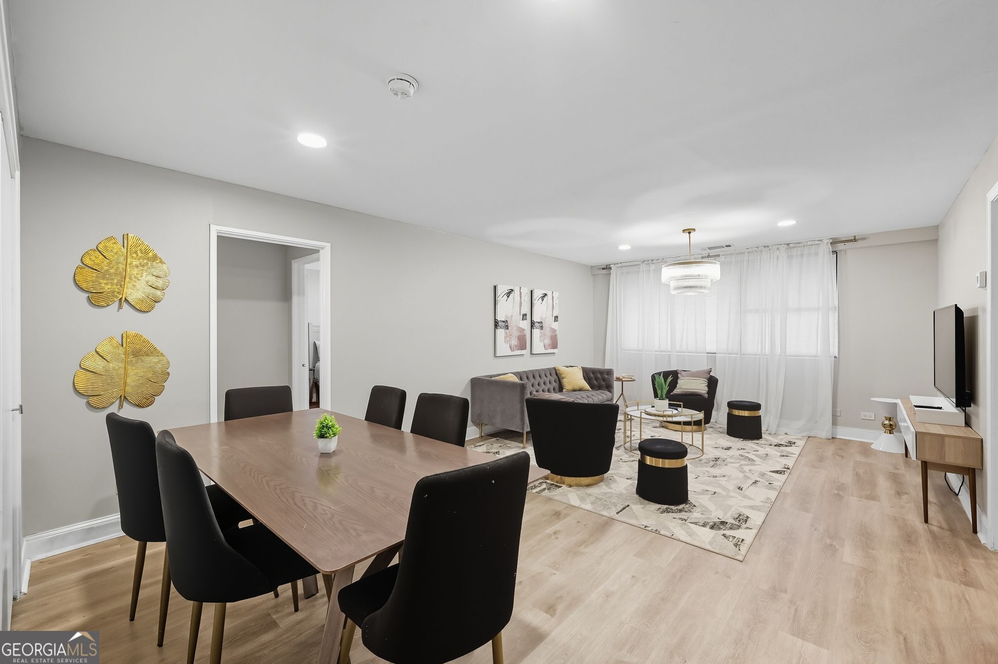a view of a dining room with furniture
