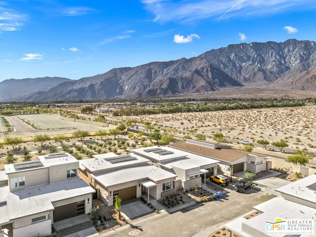 a view of a balcony with an outdoor space and lakeside