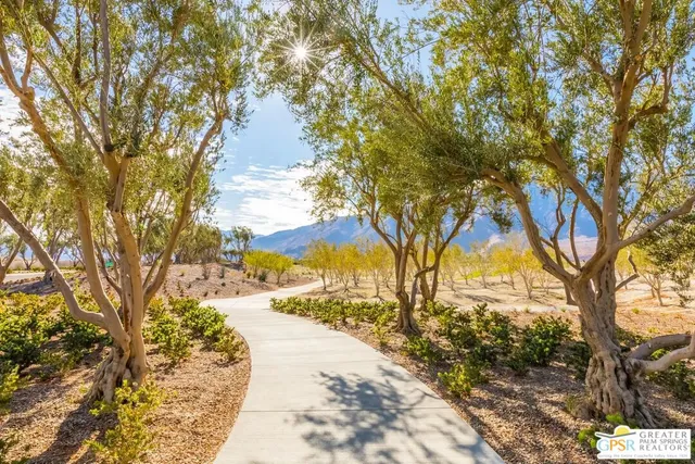 a view of swimming pool with outdoor seating
