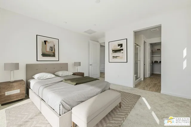 a bathroom with double vanity sink and a mirror