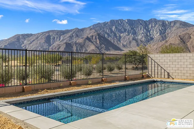 a view of outdoor space and backyard