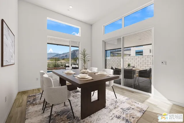 a view of a dining room with furniture