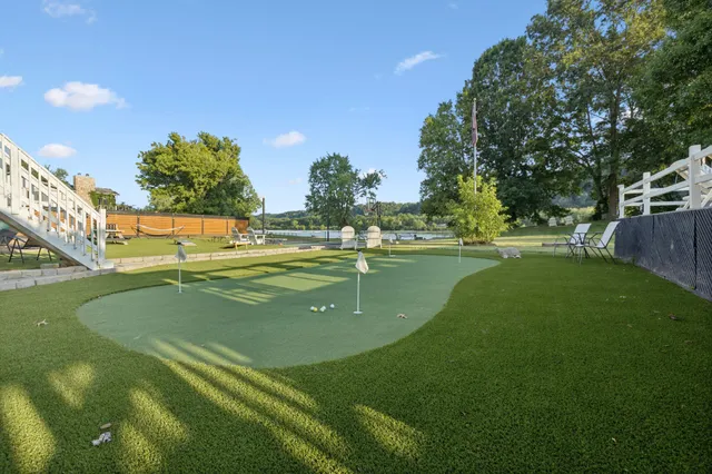 a view of a house with swimming pool