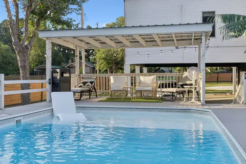 a view of a balcony with chairs