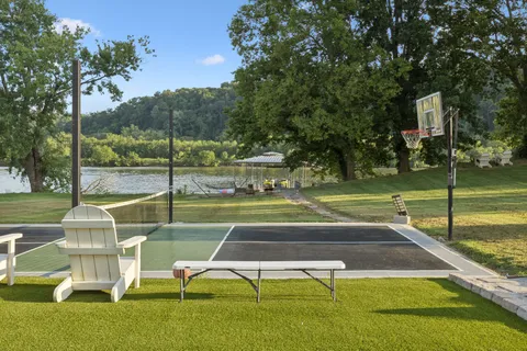 a view of a lake with a yard