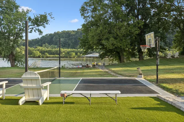 a view of a lake with a yard