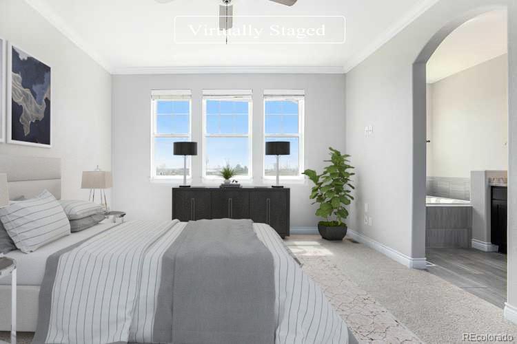 3751 West 136th Avenue, Unit C3 Broomfield, CO 80023 - Photo 3 of 20 a bedroom with a bed and a potted plant