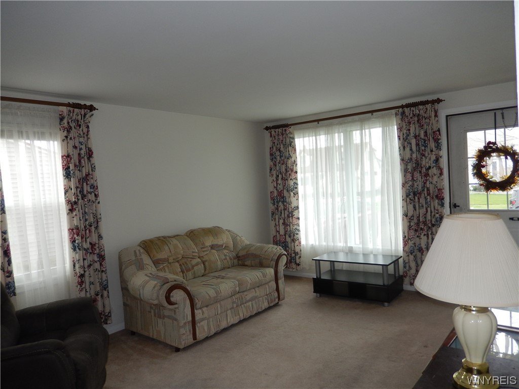 24 Isabelle Road Cheektowaga, NY 14225 - Photo 8 of 16 Living Room features wall to wall carpeting