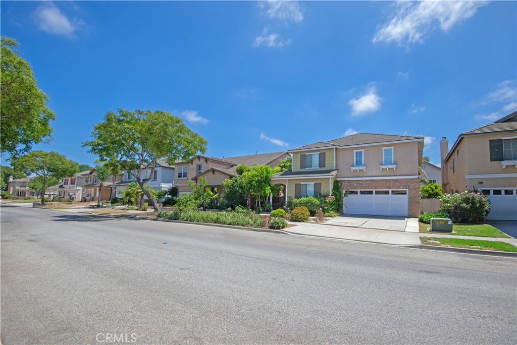 1652 Tiesa Lane Oxnard, CA 93030 - Photo 7 of 9 front view of a house with a street