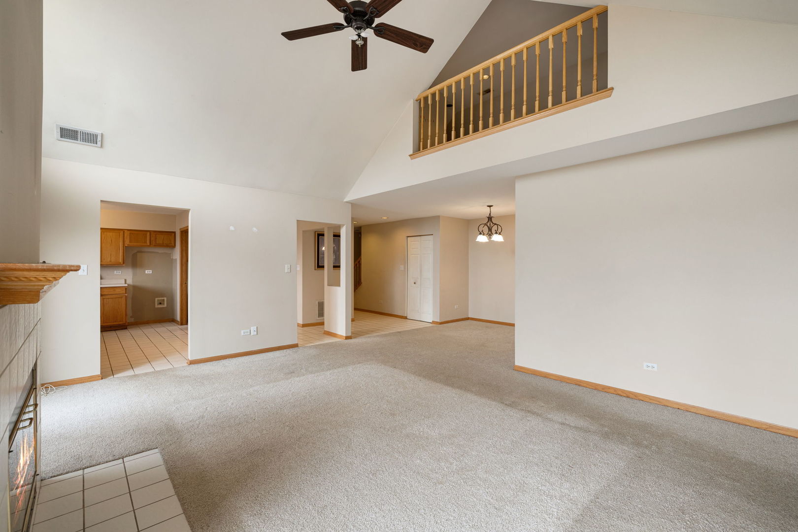 18112 Rita Road, Unit 3C Tinley Park, IL 60477 - Photo 3 of 18 a view of a livingroom with a staircase