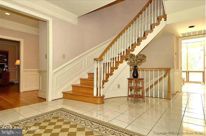10001 Meyer Point Terrace Potomac, MD 20854 - Photo 5 of 24 Curved staircase