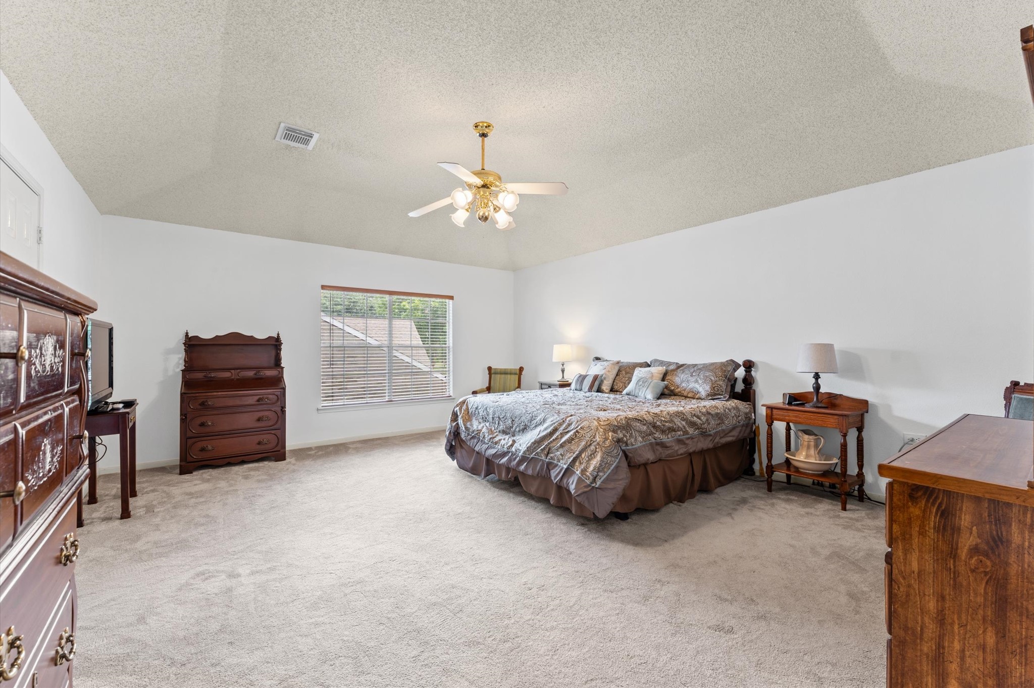 9903 Burntfork Street Houston, TX 77064 - Photo 13 of 25 Oversized freshly painted primary bedroom located on the second floor!