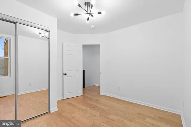 a bathroom with a toilet and shower