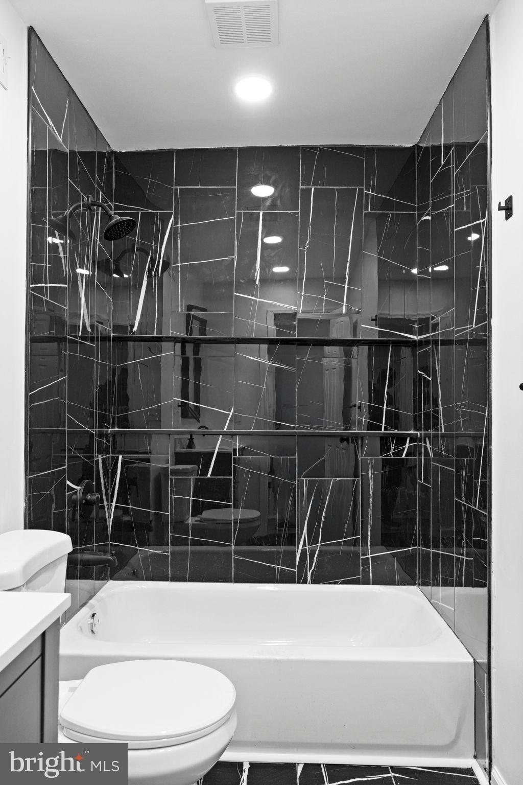 7331 East Walnut Lane Philadelphia, PA 19138 - Photo 27 of 49 a bathroom with a toilet and shower