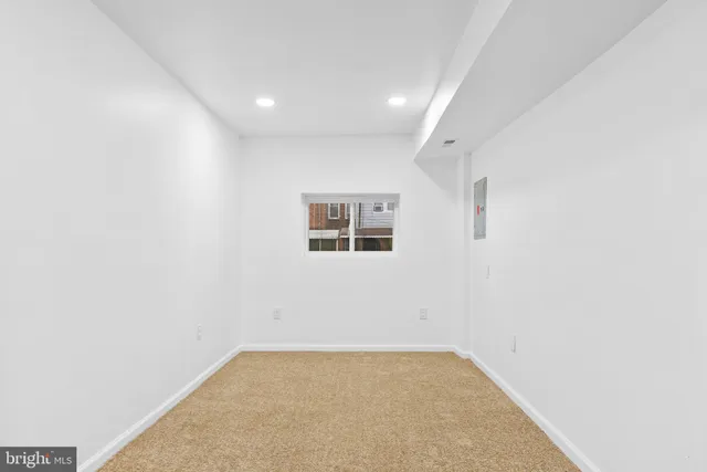 an empty room with a workbench