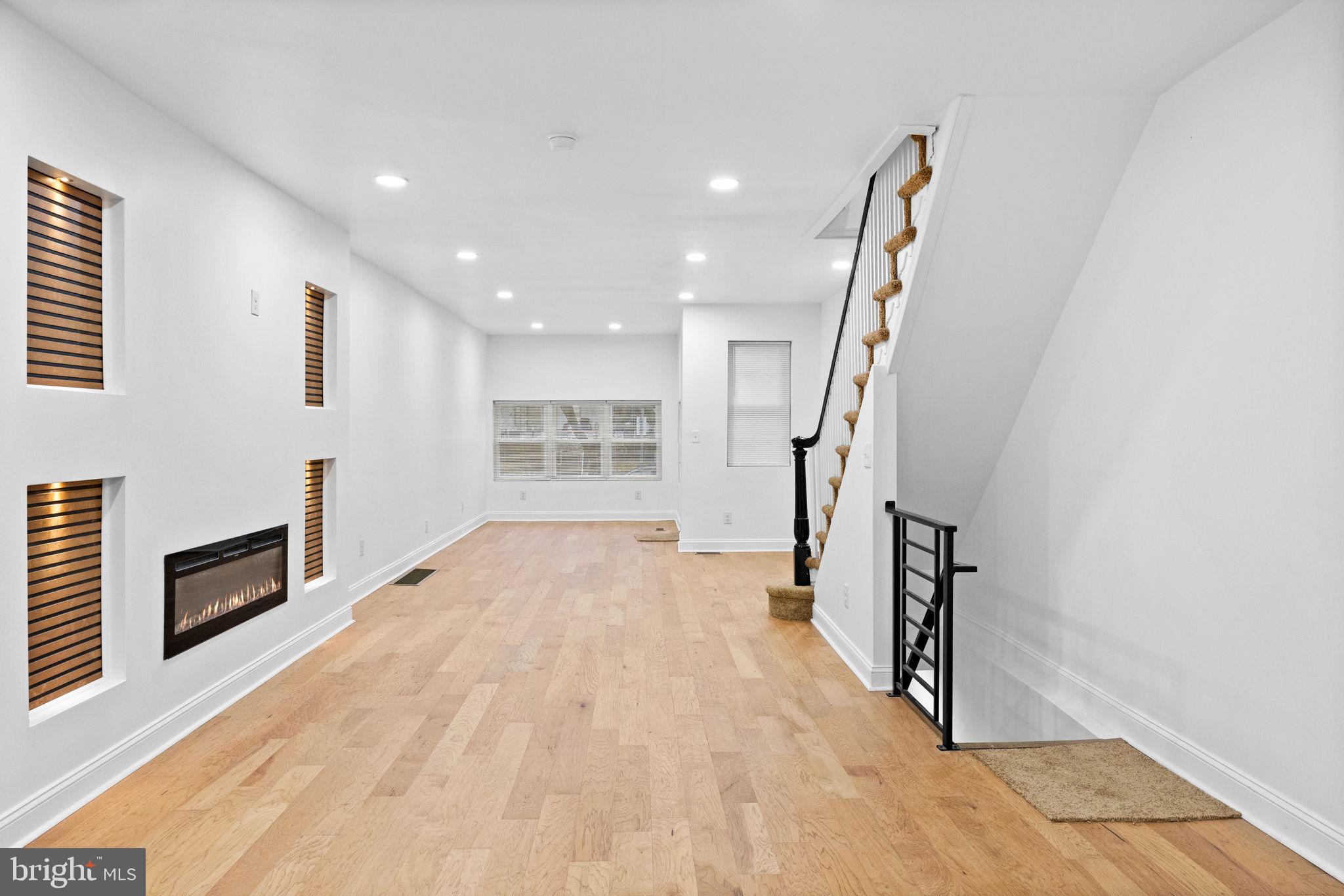 7331 East Walnut Lane Philadelphia, PA 19138 - Photo 7 of 49 a view of empty room with wooden floor and fan