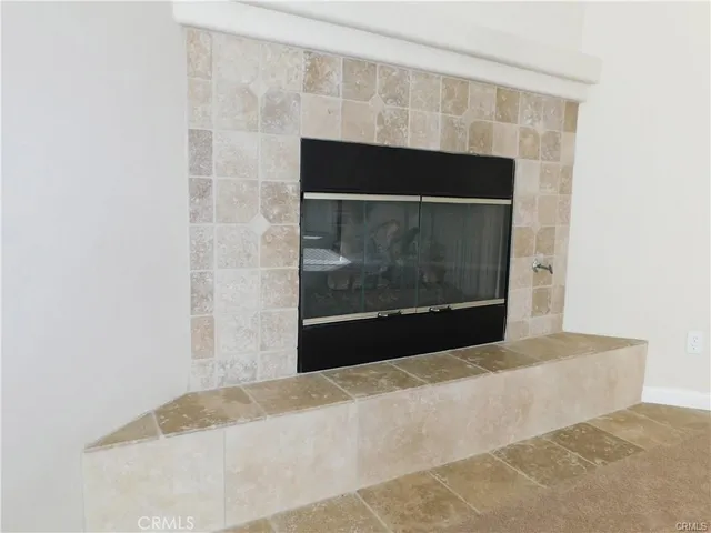 a living room with a fireplace