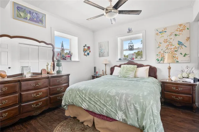 a bedroom with a bed and a dresser