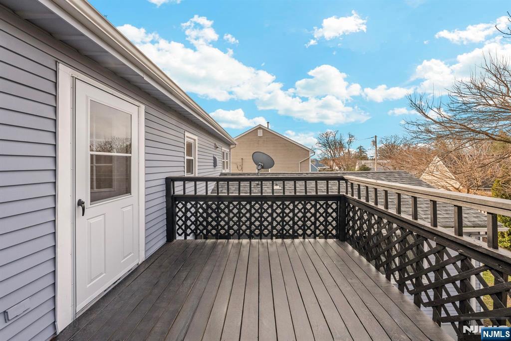 468 Broughton Avenue Bloomfield, NJ 07003 - Photo 11 of 15 a view of a balcony with wooden floor