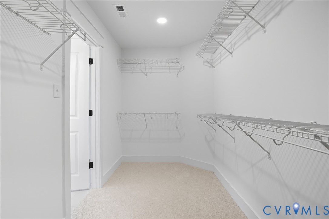 3731 Tuckmar Ridge Drive Moseley, VA 23120 - Photo 13 of 27 a view of a room with racks on the wall
