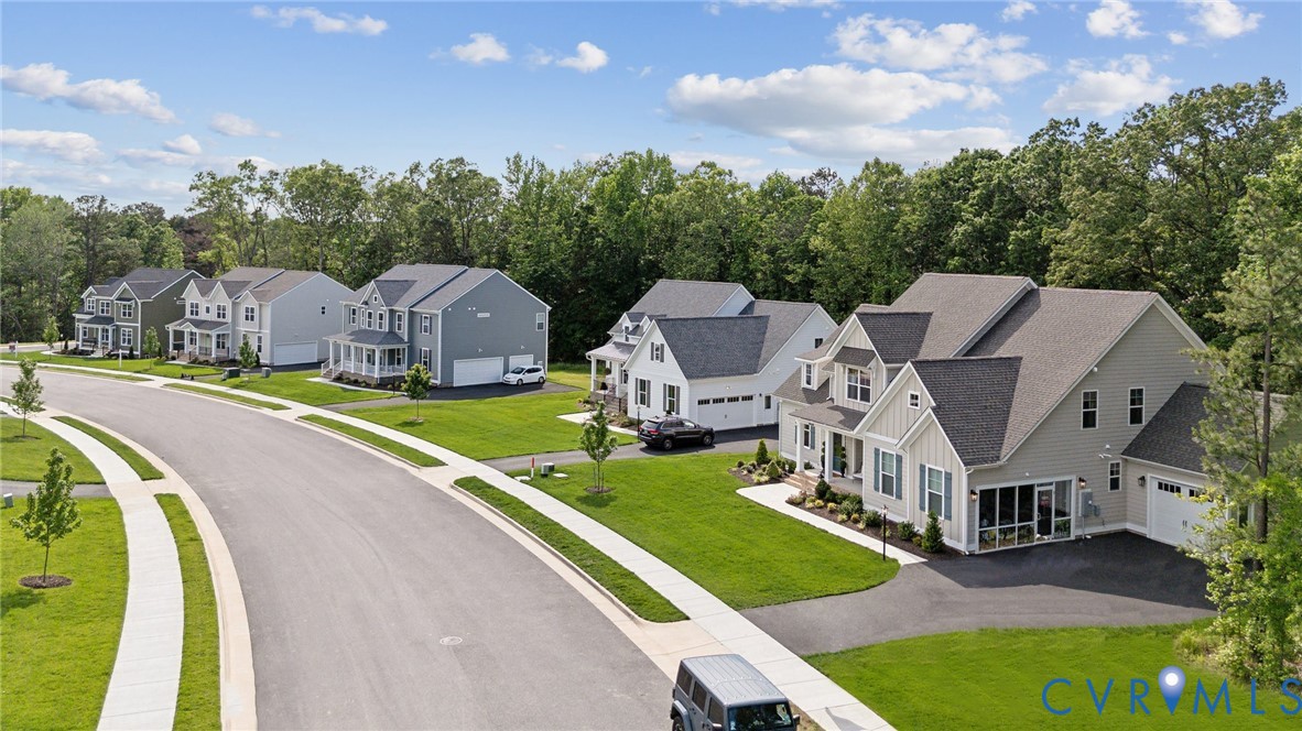 3731 Tuckmar Ridge Drive Moseley, VA 23120 - Photo 22 of 27 a aerial view of a house with swimming pool and porch