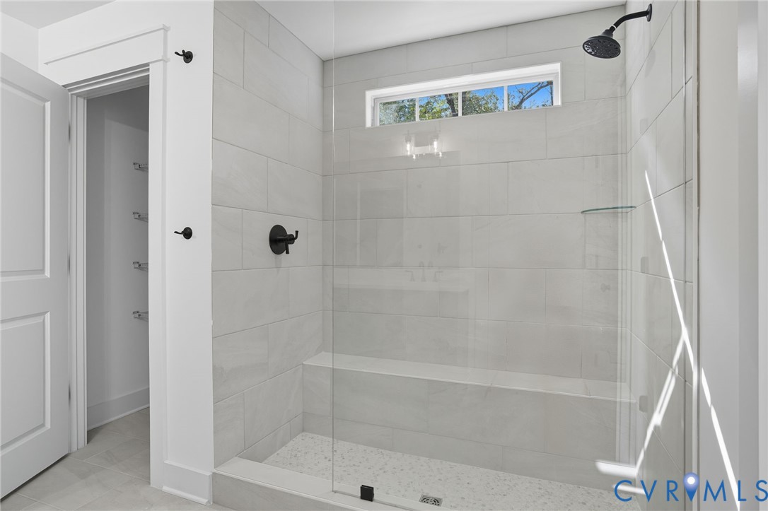 3731 Tuckmar Ridge Drive Moseley, VA 23120 - Photo 4 of 27 a bathroom with a shower