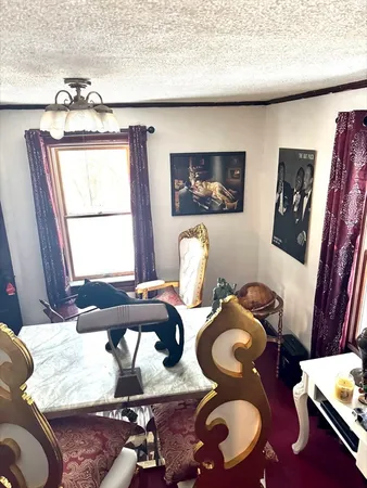 a room with furniture and window