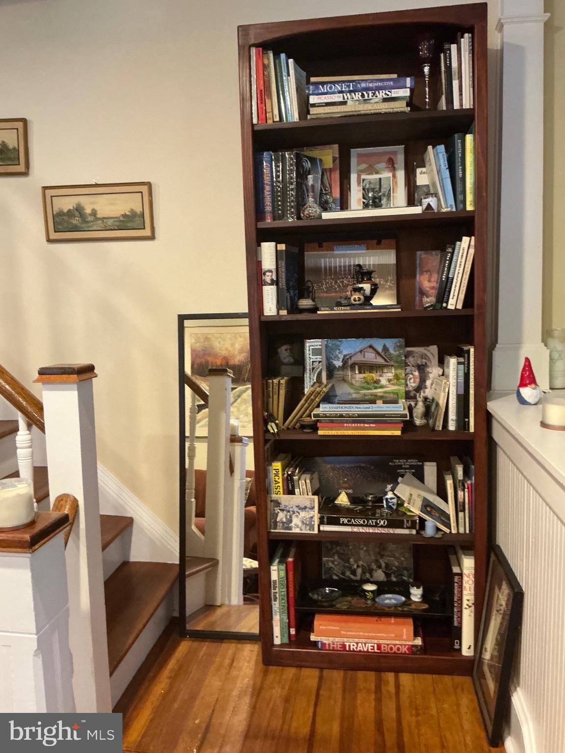 29 Centre Street Haddonfield, NJ 08033 - Photo 14 of 39 a living room with furniture and a book shelf