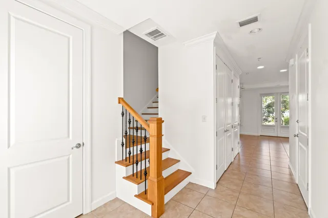 a view of an entryway with wooden floor