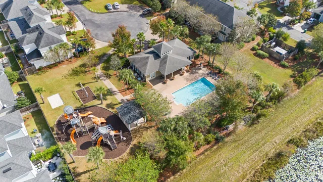 an aerial view of residential houses with outdoor space