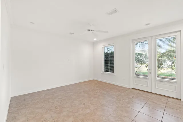 an empty room with windows