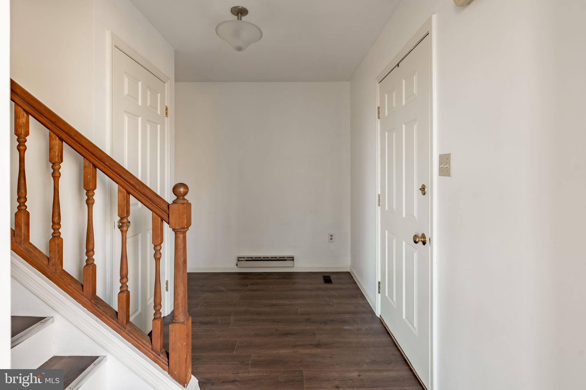 540 Grings Hill Road Reading, PA 19608 - Photo 3 of 43 a view of a hallway with wooden floor and staircase