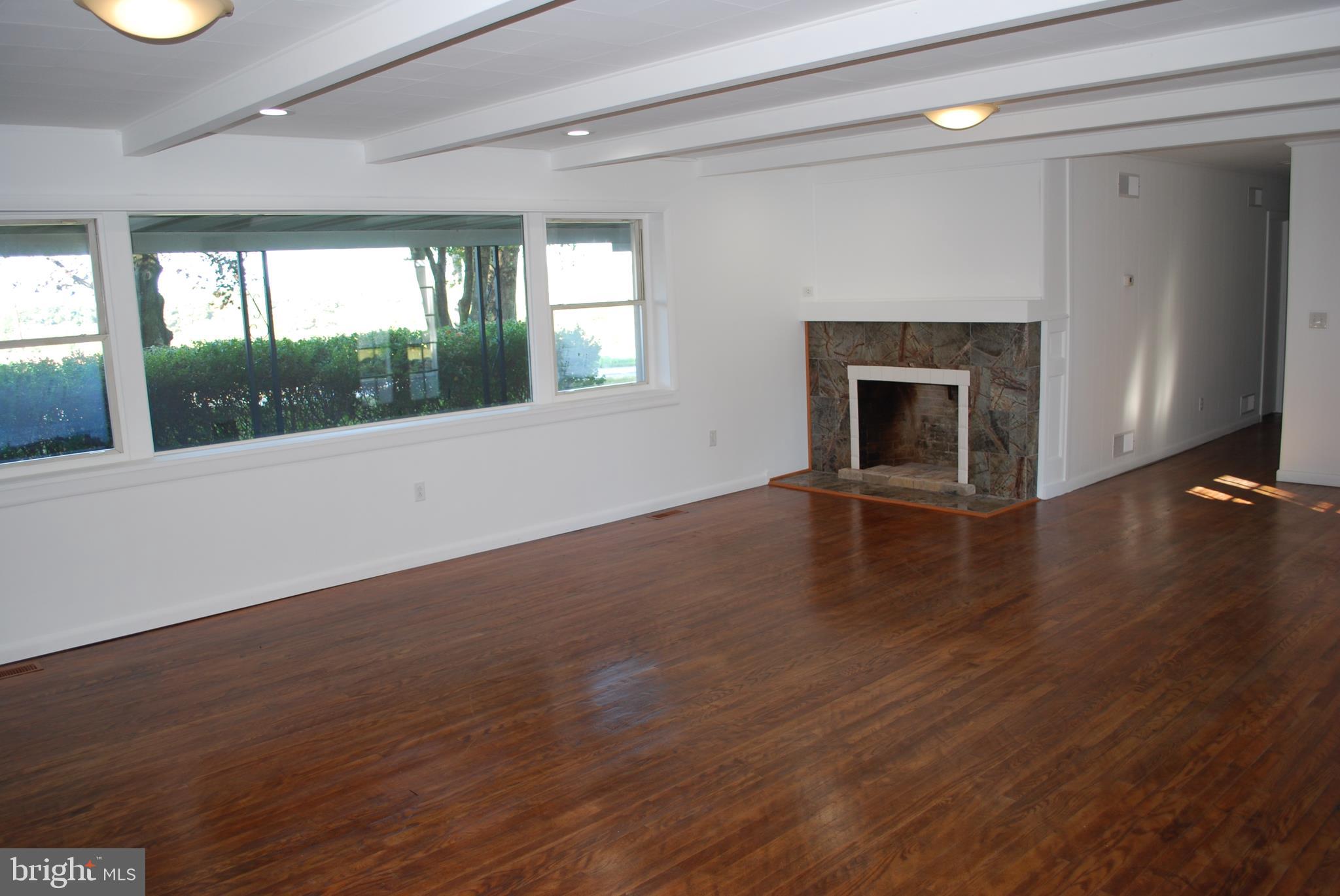 15719 Old Hanover Road Upperco, MD 21155 - Photo 13 of 34 Living room is big bright and beautiful