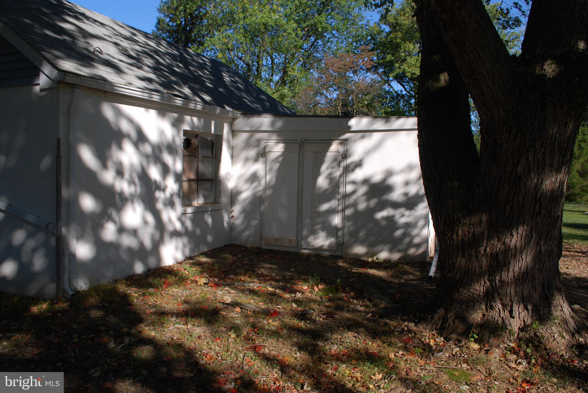 15719 Old Hanover Road Upperco, MD 21155 - Photo 23 of 34 Storage area for lawnmowers behind the garage.