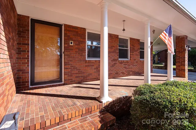 a view of house with a large window
