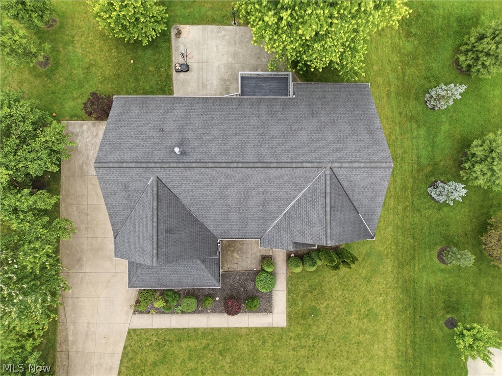 11678 Dunham Road Northfield, OH 44067 - Photo 38 of 38 Asphalt shingle roof with multiple gables and a central vent